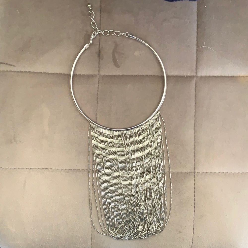 Necklace silver in color